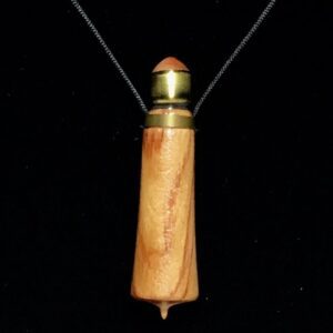 A wooden necklace with a bullet casing on it.